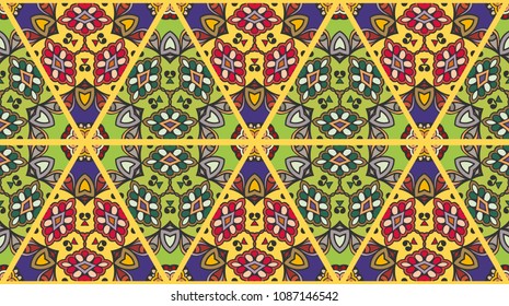 Colorful seamless triangle patchwork pattern. Abstract hand drawn art, stylized floral doodle ornament. Tribal ethnic arabic, indian decor. Vector collage quilt pattern. Textile fabric paper print