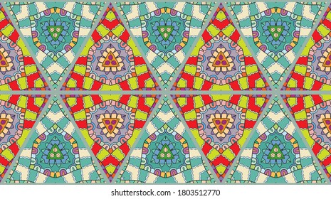 Colorful seamless triangle patchwork pattern. Abstract hand drawn art, stylized floral doodle ornament. Tribal ethnic arabic, indian decor. Vector collage quilt pattern. Textile fabric paper print