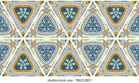 Colorful seamless triangle pattern. Abstract hand drawn art, stylized floral doodle background. Tribal ethnic arabic, indian ornament. Vector patchwork quilt pattern. Textile fabric paper print