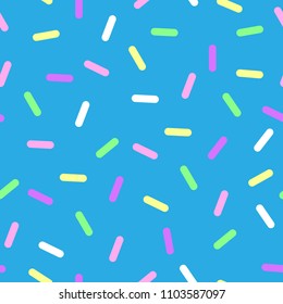 Colorful seamless vector confetti pattern. Bakery themed donut, doughnut or cupcake sugar sprinkle background.