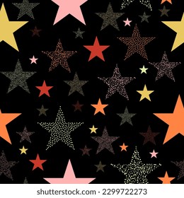 Colorful seamless vector pattern with abstract multicolor stars on an black background. Stars and scrapes are laid out in an interesting seamless pattern.