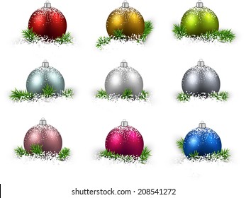 Colorful set of realistic christmas balls on snow with fir branches. Vector illustration. 