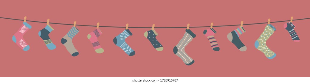 Colorful set of trendy socks. Set of colorful fun socks hang on a rope for men and women. Flat design style. Vector illustration, EPS 10.