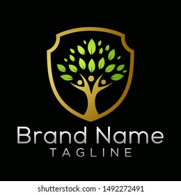 Colorful shield with abstract tree inside vector logo template
