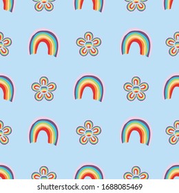 Colorful simple rainbows and flowers seamless vector pattern on blue background. Peace, hope, and pride symbols surface print design. For fabrics, stationery and packaging.