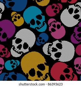 Colorful skulls on black background - seamless pattern