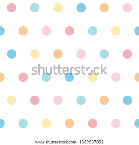Colorful small polka dot seamless pattern in soft pastel colors