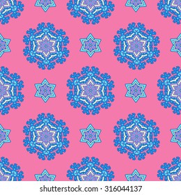 Colorful Snowflakes Seamless Pattern on pink background