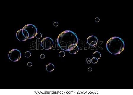  Colorful soap bubbles on a transparent background. Bright, dreamy bubbles with a rainbow gradient effect. Realistic soap bubble element vector set. Vector