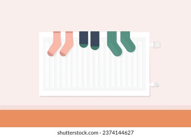 colorful socks drying on the radiator - vector illustration