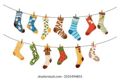 Colorful socks with various patterns hanging on clotheslines flat color vector illustration. Winter warm footwear laundry cartoon objects on white