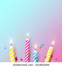 Colorful sparkling candles on pink-blue background. Birthday, anniversary or celebration template.