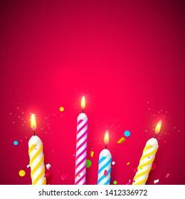 Colorful sparkling candles on red background. Birthday, anniversary or celebration template.