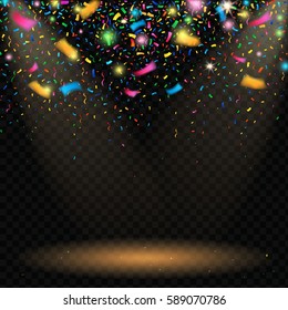 Colorful sparkling confetti with blurred elements on black background with spotlight