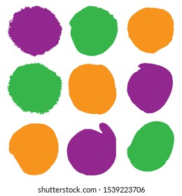 Colorful spots set for decoration. Suitable for Halloween and autumn themes and template design. Orange, green, purple circles.