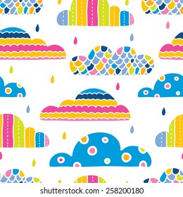 Colorful spring clouds. Vector seamless pattern.