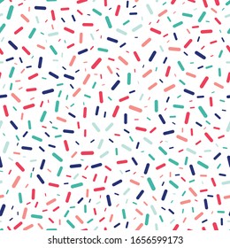 Colorful sprinkles seamless repeat vector pattern for wrapping paper, prints, fabrics.