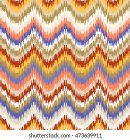 Colorful stripes ikat ornament. Vector zig zag chevron seamless pattern. 