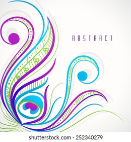 Colorful stylish floral design of peacock feather on abstract background.