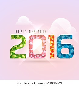 Colorful stylish text 2016 made by leaves, flowers and snowflakes on cloudy background for Happy New Year celebration.