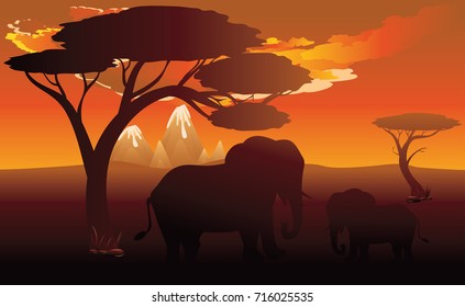 Colorful sunset scene, african landscape with silhouette of trees and elephant.