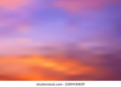 Colorful sunset sky over the ground with vibrant clouds at dusk. Colors in nature and wonder. Sky background and peace of mind.