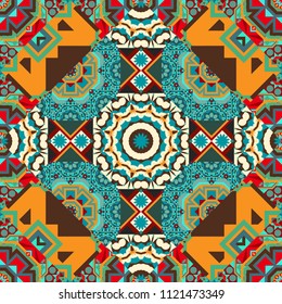Colorful symmetrical seamless pattern for textile, tiles and design in pink, green and blue tones.