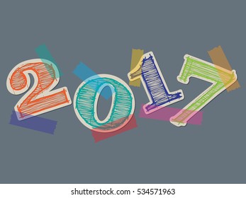 Colorful tapes taping 2017 text to gray background