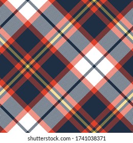 Colorful tartan Scotland plaid pattern. Seamless diagonal blue, red, yellow, white check plaid for blanket, scarf, duvet cover, or other autumn winter fabric design.
