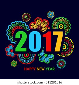 Colorful text 2017 with beautiful snowflakes, Elegant greeting card design for Happy New Year celebration.