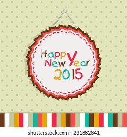 Colorful text of Happy New Year 2015 in a beautiful hanging frame on stylish background.