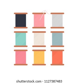 Colorful thread rolls icon illustration