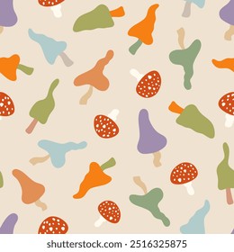 Colorful toadstools vector seamless pattern. Cute poisonous inedible red fly agaric and whimsical mushrooms on beige background. Fairy forest harvest, autumn repeat tile for Halloween, fall designs