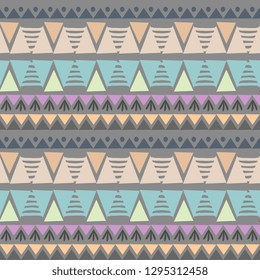 Colorful triangle chevron ikat tribal aztec pastel colors seamless pattern vector illustration ready for fashion textile print.