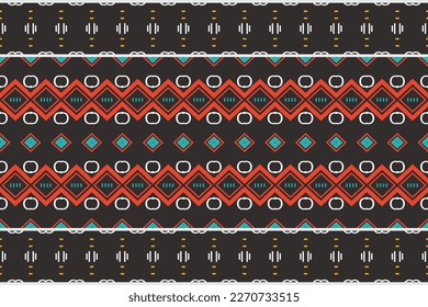 The colorful tribal pattern design. It is a pattern geometric shapes. Create beautiful fabric patterns. Design for print. Using in the fashion industry.