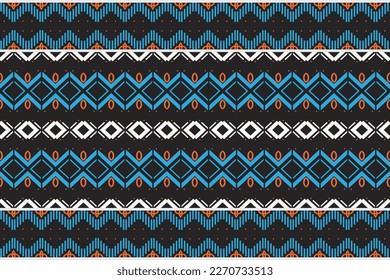The colorful tribal pattern design. traditional patterned carpets It is a pattern geometric shapes. Create beautiful fabric patterns. Design for print. Using in the fashion industry.