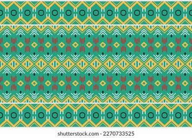 The colorful tribal pattern design. traditional pattern design It is a pattern geometric shapes. Create beautiful fabric patterns. Design for print. Using in the fashion industry.