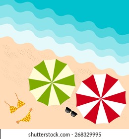 colorful umbrella, sun glass and bikini on the beach in summer holiday from top view