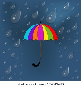 Colorful umbrella under rain