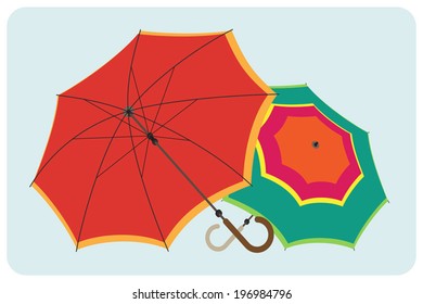 Colorful umbrellas on plain background