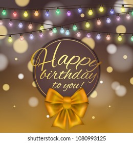 Colorful vector birthday card decorated with bow and glowing light bulbs design