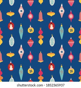 Colorful vector pattern with Christmas tree toys and blue background