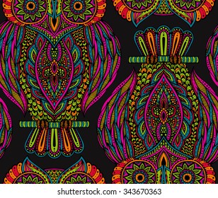 Colorful vector seamless pattern with beautiful hand drawn ornate owls on branches