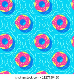 Colorful vector seamless pattern of funny donuts. Inflatable toys isolated on a blue water. Fashionable flat style print design for textiles