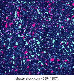 Colorful vector splatters on a black background