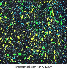 Colorful vector splatters on a black background