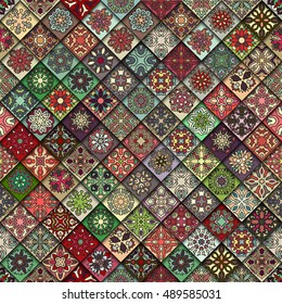 Colorful vintage seamless pattern with floral and mandala elements.Hand drawn background. Can be used for fabric, wallpaper, tile, wrapping, covers and carpet. Islam, Arabic, Indian, ottoman motifs.