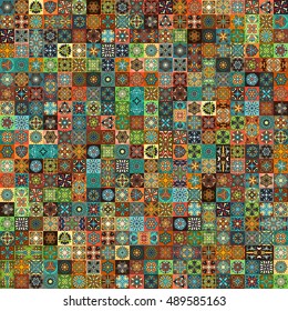 Colorful vintage seamless pattern with floral and mandala elements.Hand drawn background. Can be used for fabric, wallpaper, tile, wrapping, covers and carpet. Islam, Arabic, Indian, ottoman motifs.