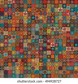 Colorful vintage seamless pattern with floral and mandala elements.Hand drawn background. Can be used for fabric, wallpaper, tile, wrapping, covers and carpet. Islam, Arabic, Indian, ottoman motifs.