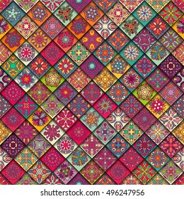 Colorful vintage seamless pattern with floral and mandala elements.Hand drawn background. Can be used for fabric, wallpaper, tile, wrapping, covers and carpet. Islam, Arabic, Indian, ottoman motifs.
